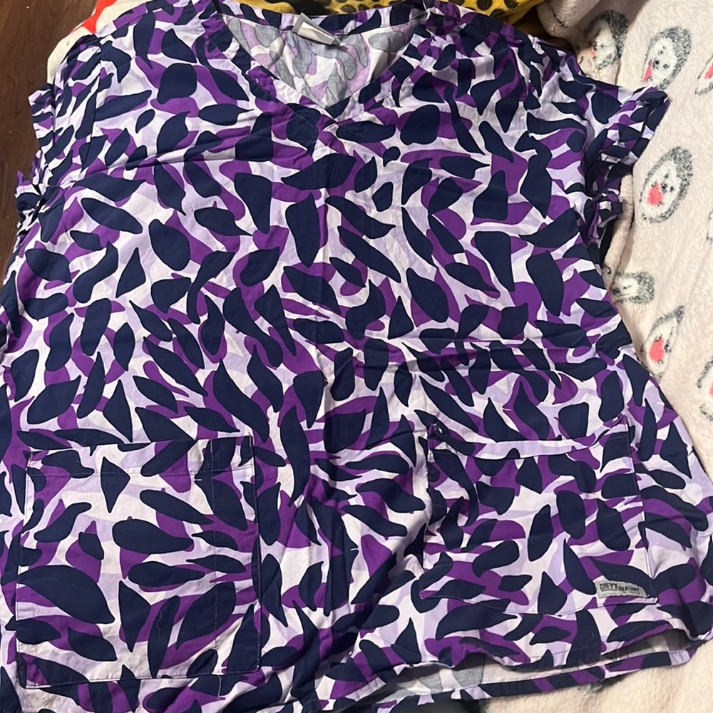 Worn once. Scrub top.